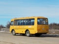 Yellow russian school bus. Russian text: `Development of education in Nizhny Novgorod region. Children.