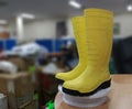 Yellow safety boots for workers, to protect their feet from work accidents