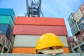 Yellow safety helmet on container ship Royalty Free Stock Photo