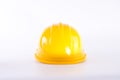 Yellow safety helmet on white background. Hard hat isolated on white. Safety equipment concept. Worker and Industrial theme Royalty Free Stock Photo