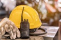 Yellow safety helmet for worker in factory. Industrial and construction