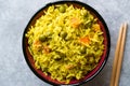 Yellow Saffron Basmati Rice with Turmeric and Vegetables Pilav or Pilaf in Bowl with Chopsticks. Royalty Free Stock Photo