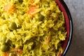 Yellow Saffron Basmati Rice with Turmeric and Vegetables Pilav or Pilaf in Bowl. Royalty Free Stock Photo