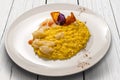 Yellow saffron risotto with cuttlefish