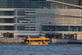 the yellow sailboat crosses Victoria harbor, hk 13 Nov 2021