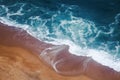 Yellow sand beach and azure foam wave, shot from above, nature o