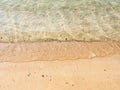 Yellow sand and clear blue ocean water background Royalty Free Stock Photo