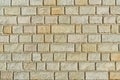 Yellow sandstone bricks wall background abstract texture. Royalty Free Stock Photo