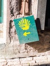 The yellow scallop shell signing the way to Santiago de Compostela in Porto, on the Saint James pilgrimage route Royalty Free Stock Photo