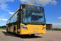 Yellow Scania Citywide Bus at Bus Stop