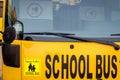 Yellow school bus in Abu Dhabi, United Arab Emirates, Dubai, Emirates, Gulf, Middle east. Awareness signs and symbol was written