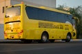 Yellow school bus in Abu Dhabi, United Arab Emirates, Dubai, Emirates, Gulf, Middle east. Awareness signs and symbol was written