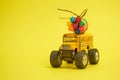 Yellow School bus and felt-tip pens on the roof, back to school concept, yellow background, copy space. education Royalty Free Stock Photo