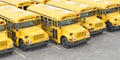 Yellow school bus in a row on a parking Royalty Free Stock Photo