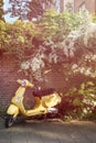 Yellow scooter parked Royalty Free Stock Photo