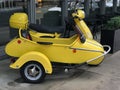 Yellow Scooter and Sidecar in Downtown Buildings in Vancouver, British Columbia