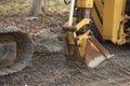 Yellow Scratched up Digger or Excavator