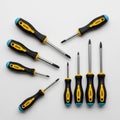 Yellow screwdrivers with ergonomic handles featuring a blue cap on Royalty Free Stock Photo