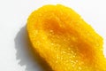Yellow scrub closeup texture. Organic beauty exfoliating cosmetic. Natural smudged peeling. Skin care salt, sugar treatment