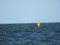 Yellow Sea water windmill blue sky