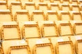 Yellow seats in a football stadium Royalty Free Stock Photo