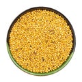 Yellow seeds of mustard in round bowl isolated Royalty Free Stock Photo