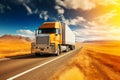 Yellow Semi Truck Driving Along Desert Road Royalty Free Stock Photo