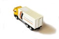A yellow semi truck with a white trailer attached. Isolated on a white background. Clipping path included Royalty Free Stock Photo