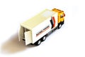 A yellow semi truck with a white trailer attached. Isolated on a white background. Clipping path included Royalty Free Stock Photo