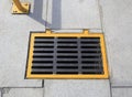 Yellow sewer cover