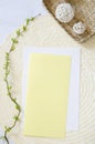 Yellow sheet on light marble texture background. Mock up template design. Royalty Free Stock Photo
