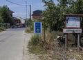 A yellow shell and arrow sign that guides the pilgrims along the Camino de Santiago Way of Saint James. Camponaraya, Spain. Royalty Free Stock Photo