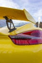 yellow shiny body of a german sportscar