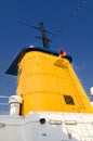 Yellow Ship Funnel Against Blue Sky