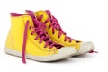 Yellow shoes with pink shoelace Royalty Free Stock Photo