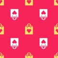 Yellow Shopping bag with heart icon isolated seamless pattern on red background. Shopping bag shop love like heart icon Royalty Free Stock Photo