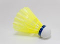 The yellow shuttlecock or badminton ball in white background with copy space Royalty Free Stock Photo