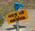 Yellow Sign on Out of Order Water spigot Royalty Free Stock Photo