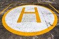 Sign on Concrete surface. Helipad for helicopter landing