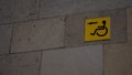 Yellow sign with a disabled person. Copyspace Royalty Free Stock Photo