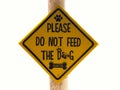 Yellow Sign Do not Feed the Dog.