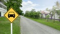 Yellow sign with painting car on the road side to allow only cars to enter the area Royalty Free Stock Photo