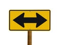 Yellow sign with two arrows pointing in opposite