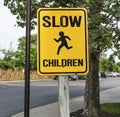 Slow down children plyaing sign Royalty Free Stock Photo