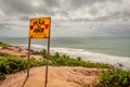 Pipa, Brazil - 21 June 2019: Cloudy day in beach of love. The yellow sign welcomes visitors in Pipa, Tibau do Sul, Rio Grande do Royalty Free Stock Photo