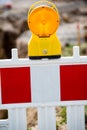 Yellow signal lamp on construction site Royalty Free Stock Photo