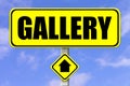 Yellow signboard with the word Gallery written