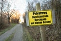 Yellow signpost for a private road in german Royalty Free Stock Photo