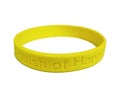 Yellow silicone wristband Royalty Free Stock Photo