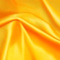 Yellow silk fabric background is elegant and gentle. AI Generated. Royalty Free Stock Photo
